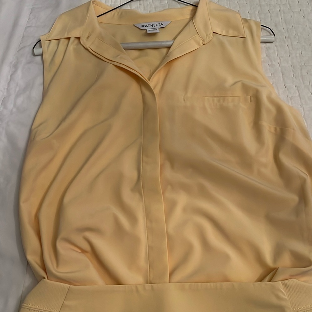 Beautiful NWOT soft yellow 2 piece outfit button down front with built in shorts